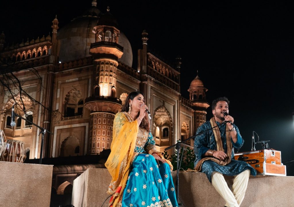 Pratibha Singh Baghel and Prithvi Gandharv against the backdrop of Safdarjung Tomb.