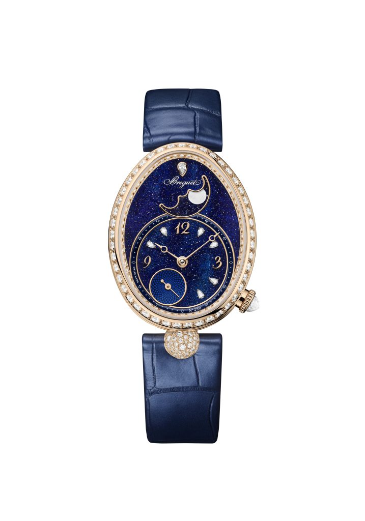 Breguet Reine de Naples is housed in an elongated 36.5 × 28.45 mm case crafted in 18K Breguet gold with the maison’s signature fluted caseband