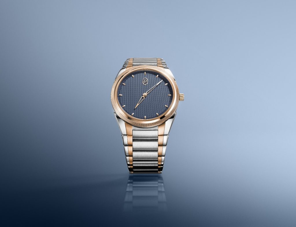 This stainless steel and rose gold watch has a deep mineral