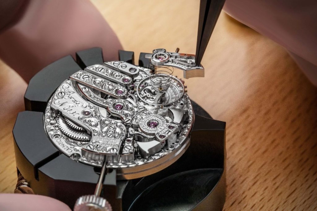 True guilloche is created by cutting patterns into a metal blank mounted on an engraving engine