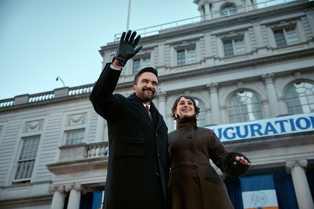 Mayor Zohran Mamdani, left, stands with his wife, Rama Duwaji, Zohran Mamdani takes office, Zohran Mamdani NYC leadership, Zohran Mamdani mayor ceremony, Zohran Mamdani financial disclosure, Zohran Mamdani rent-stabilized apartment,