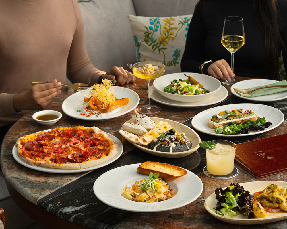 Food Table Shot Vicoli, charcoal hummus, food vicoli, how is the food at vicoli, Vicoli romantic dining Gurugram, Vicoli luxury dining Gurugram