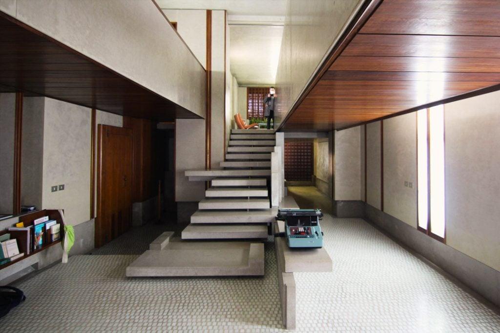 He believed architecture should be felt underfoot, brushed by hand, and discovered in fragments