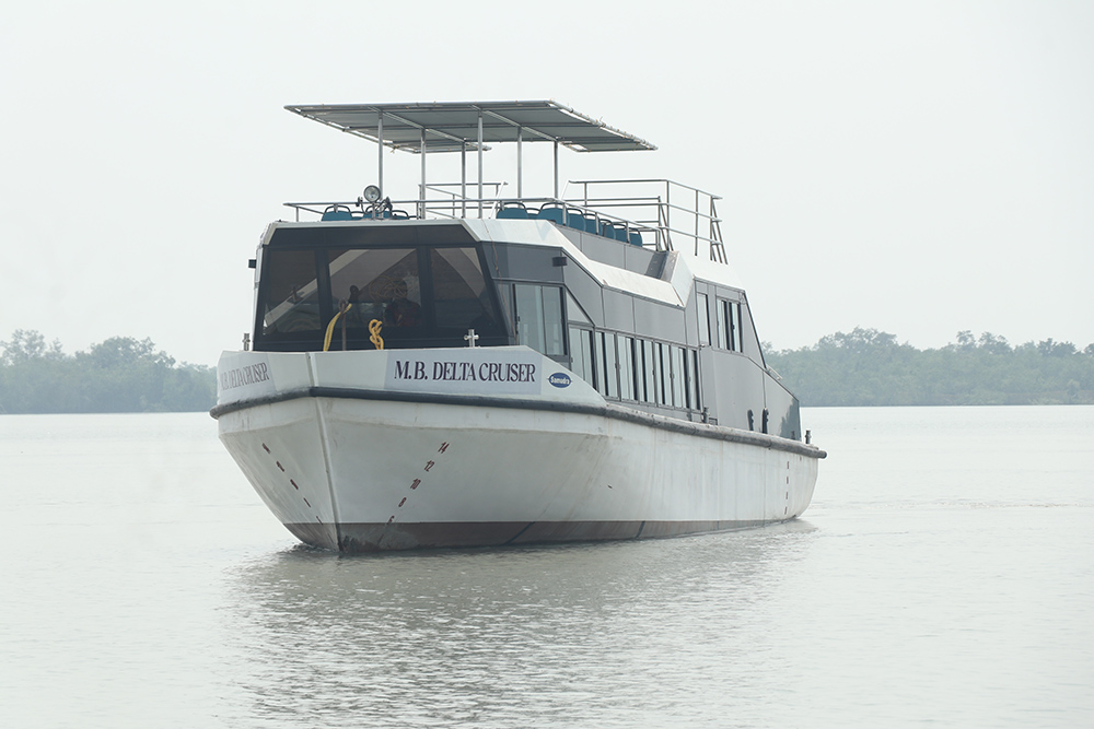A luxury boat safari in the Sundarban mangrove forest, heritage destinations India, secret getaways India, West Bengal culture,