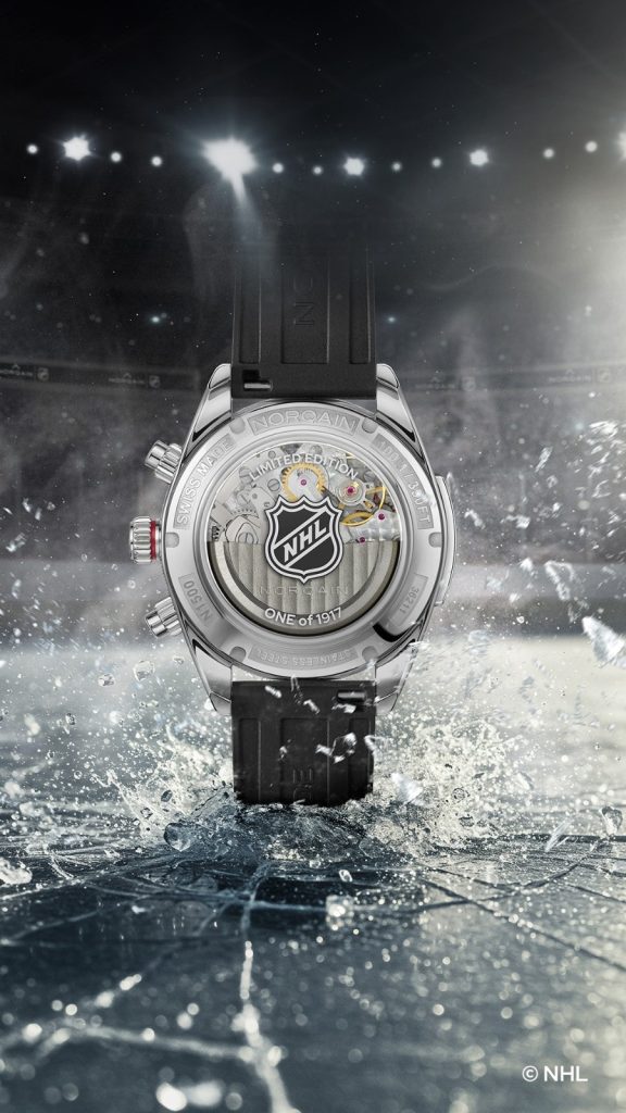 The watch may be paired with three strap options: a black rubber strap incorporating material from a hockey puck