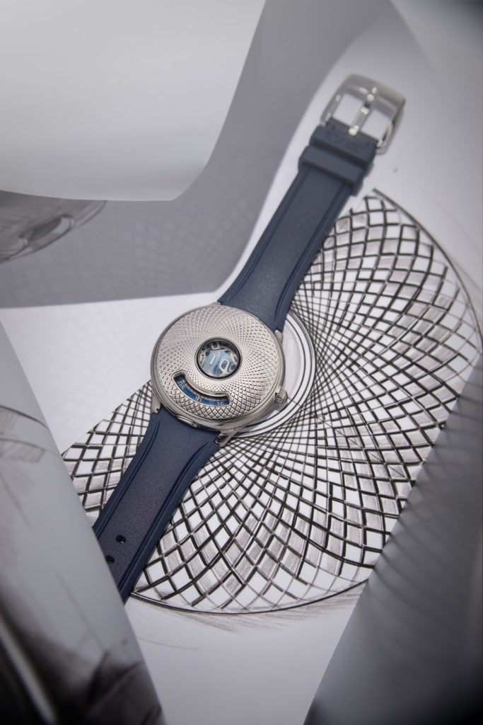 The Czapek & Cie Time Jumper features a 40.5mm steel case with a white gold guilloché cover insert, crafted with Metalem in an exclusive pattern