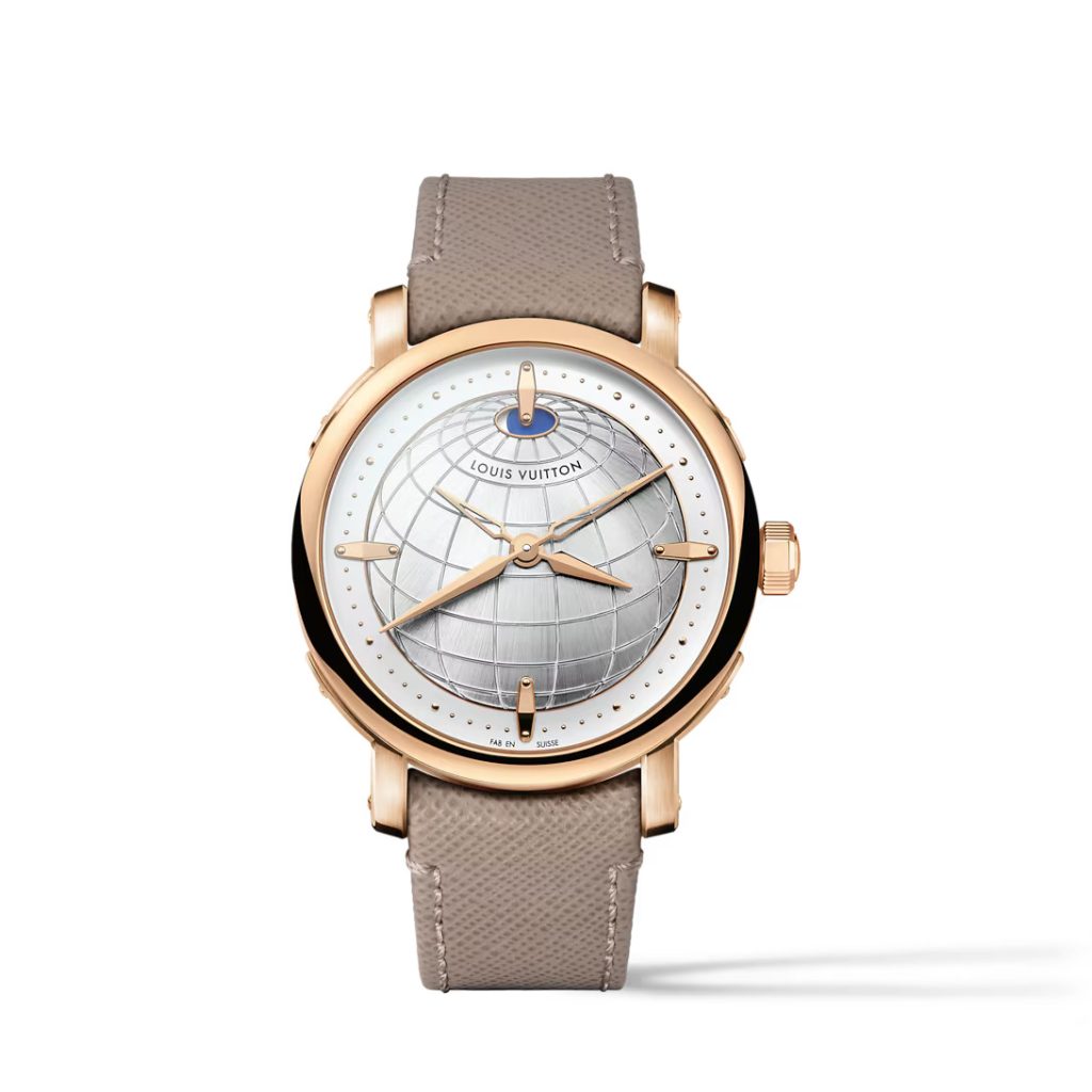 Rose gold full bodied hands indicate local time, balanced elegantly by skeletonised rose gold hands for home time