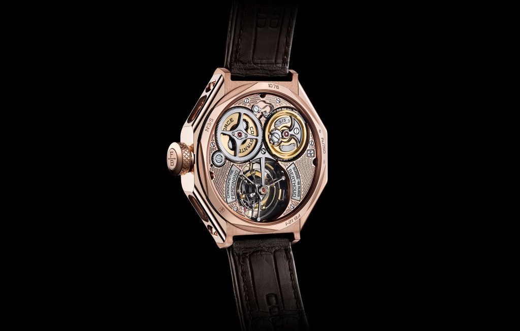 The tourbillon is mounted within a large aperture and supported by finely finished bridges