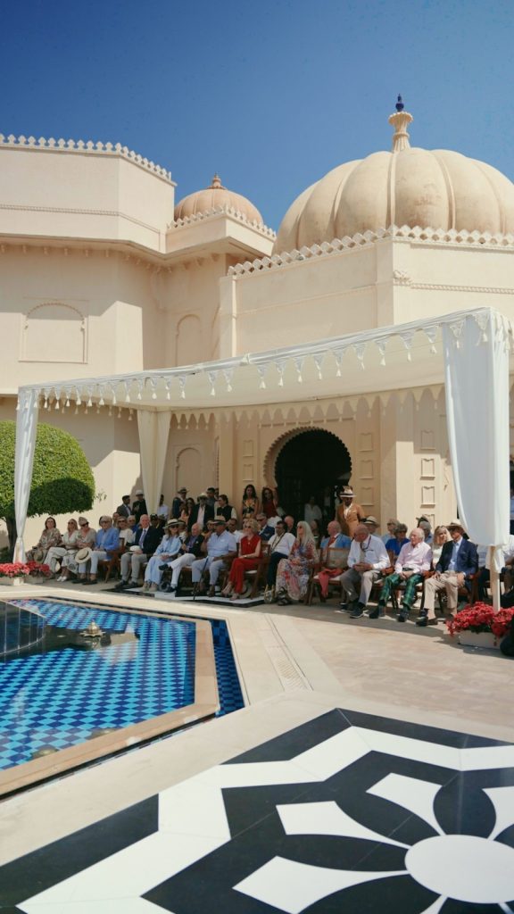 Along the iconic stretch bordering Fateh Sagar Lake, participating automobiles
