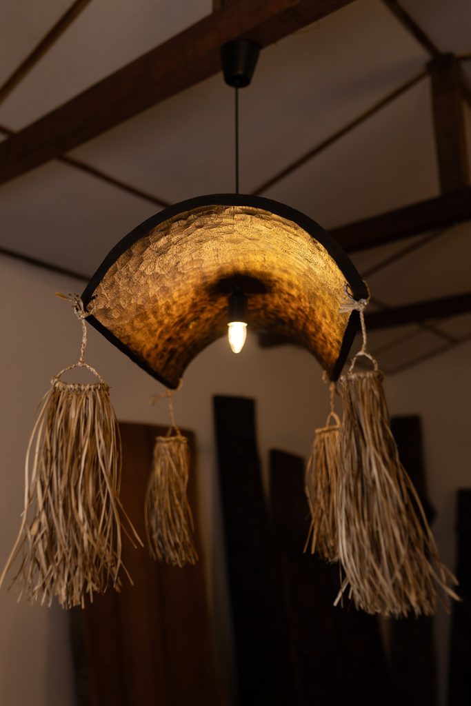 recycled wood furniture, upcycled wood designs, Naga craftsmanship, eco-friendly furniture India, handmade wooden furniture, traditional Naga art, reclaimed wood furniture, 