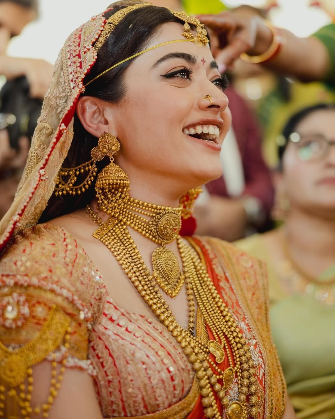 Rashmika wedding outfit, Rashmika Temple jewelry bridal look,Rashmika Ramayana inspired bridal look,Rashmika bridal saree and jewelry details,Rashmika Vijay Ramayana wedding theme,Rashmika bridal fashion