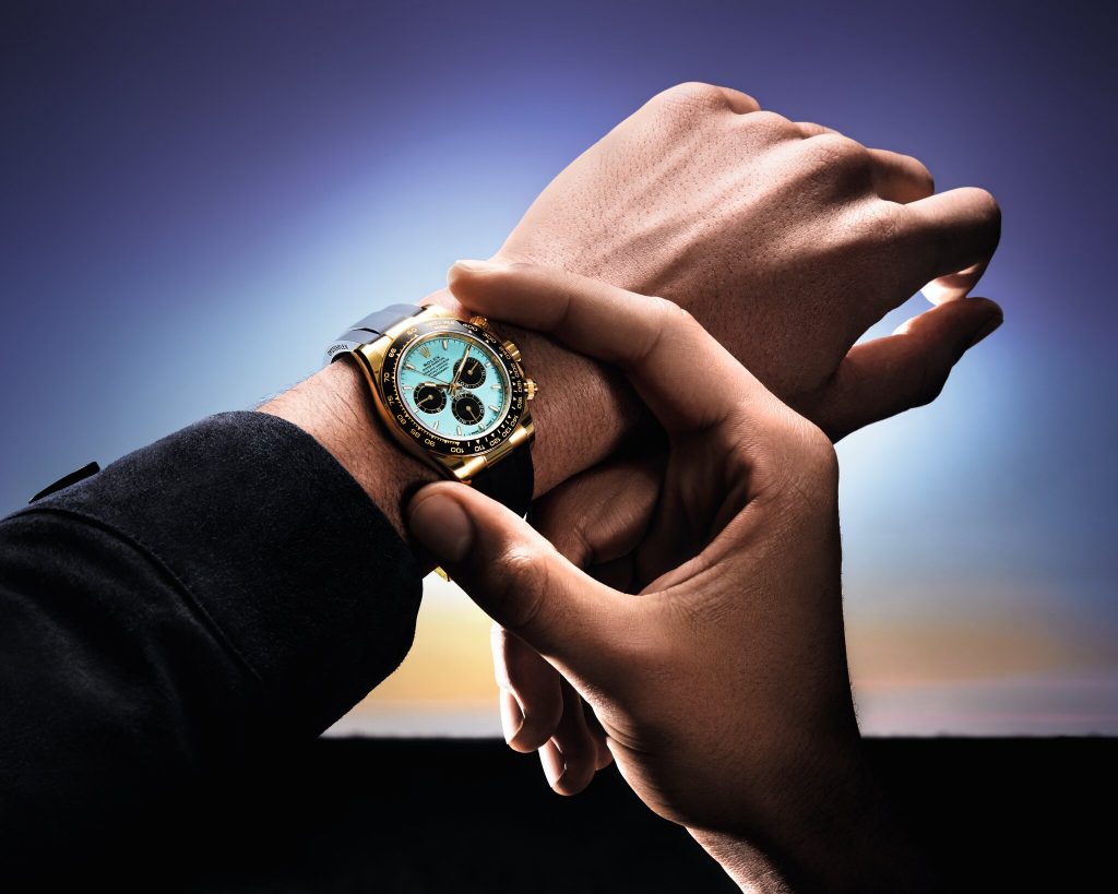 Hooded lugs conceal the strap attachment beneath an extended case structure