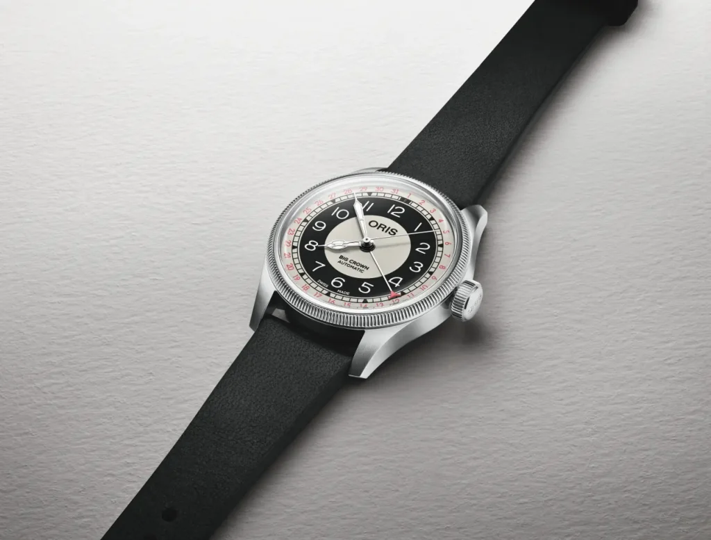 his 38mm multi-piece stainless steel case features a fluted bezel