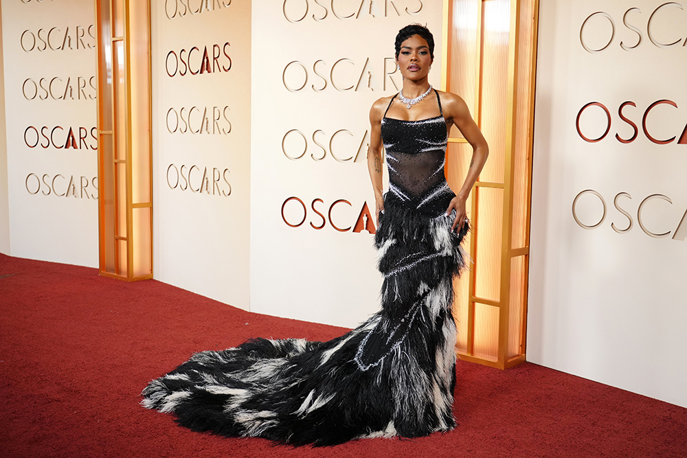 best dressed celebrities Oscars,Oscars 2026 outfits,Teyana Taylor in Chanel, Teyana Taylor at oscars 2026, Teyana Taylor in black gown at osc ars 2026, Teyana Taylor red carpet style