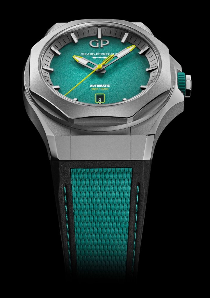 With a crown at 3 o'clock, this model is housed in a 44 mm case made of grade 5 titanium. The dial in an Aston Martin Green