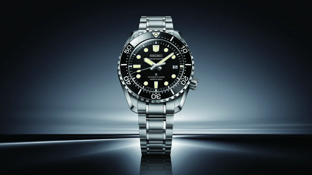 In contrast, the continuous model embraces a deep black dial with a fine grain texture designed