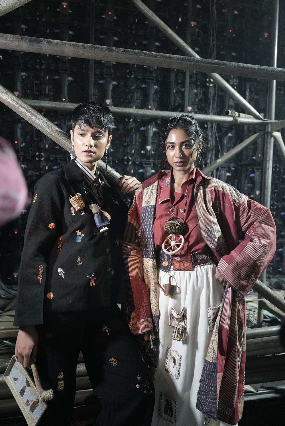 Playful details of handcrafted crockery, baskets, mannequins, earrings, and badges