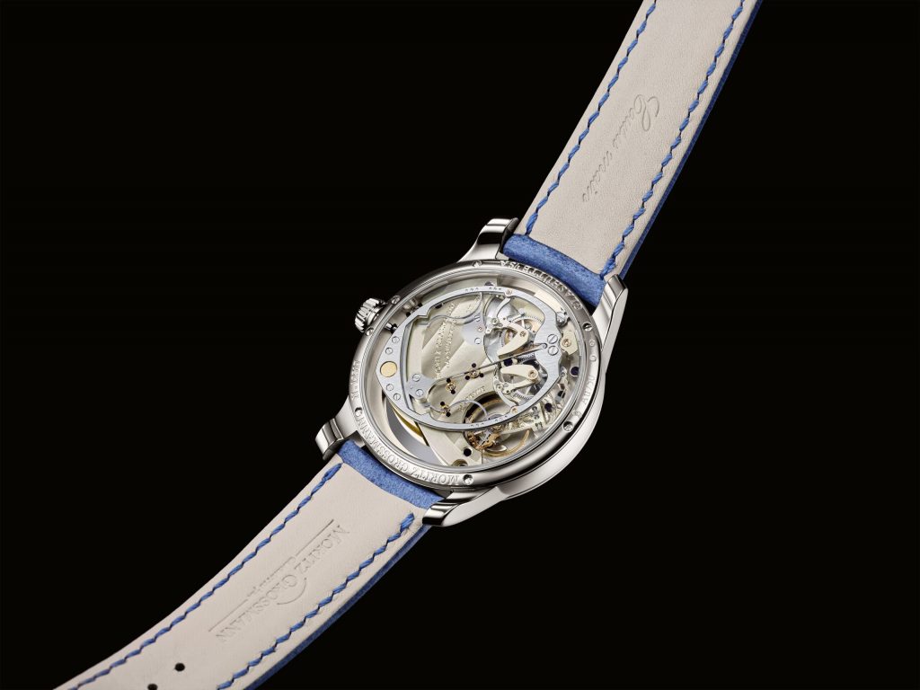 Turn it over, and through the sapphire crystal caseback, you can see all of this mechanical theatre in motion