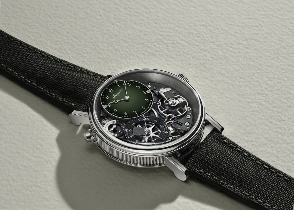 he Breguet Tradition GMT 7067 is what happens when Breguet decides that telling time in one place is simply not ambitious enough