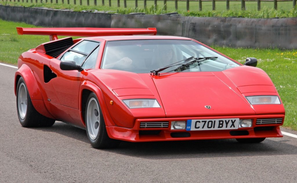 Aries demands drama and immediacy, and few cars deliver it like the Countach