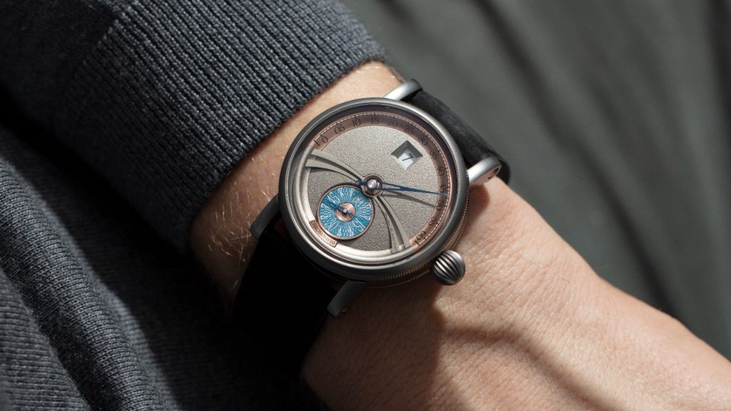 The dial, however, is where things take a turn into the delightfully eccentric. Built as a three dimensional structure