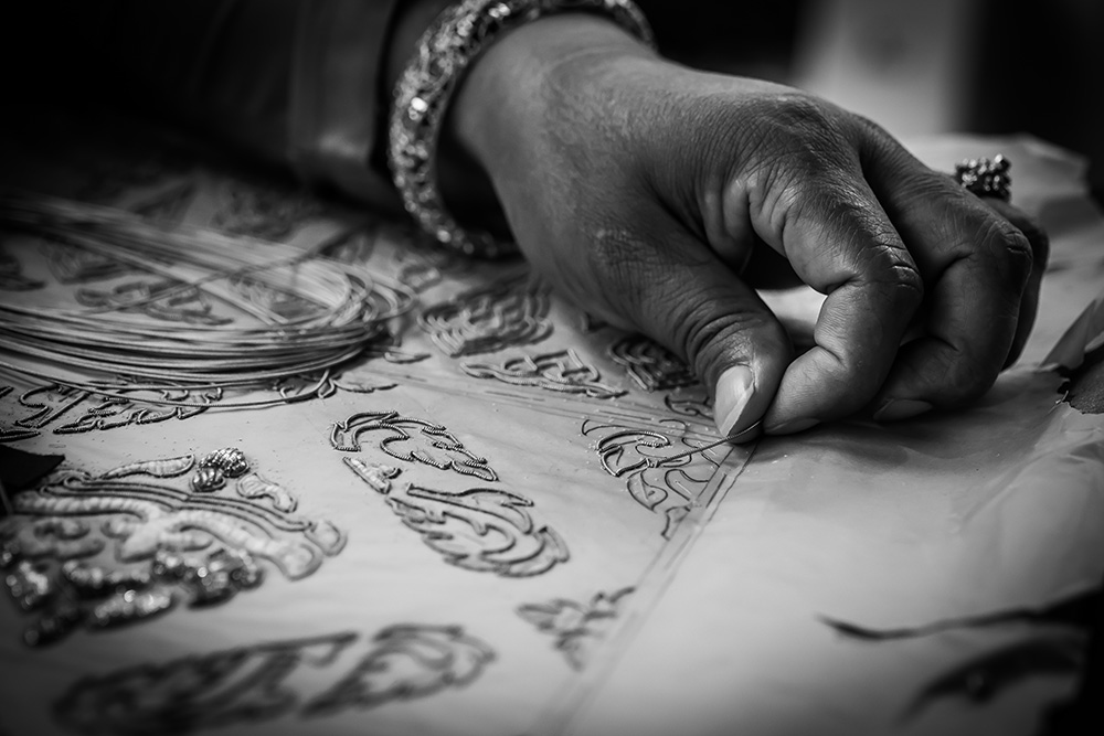 luxury fashion supply chain ethics, handmade textiles fair trade wages, craft workers financial insecurity, fashion industry labor inequality