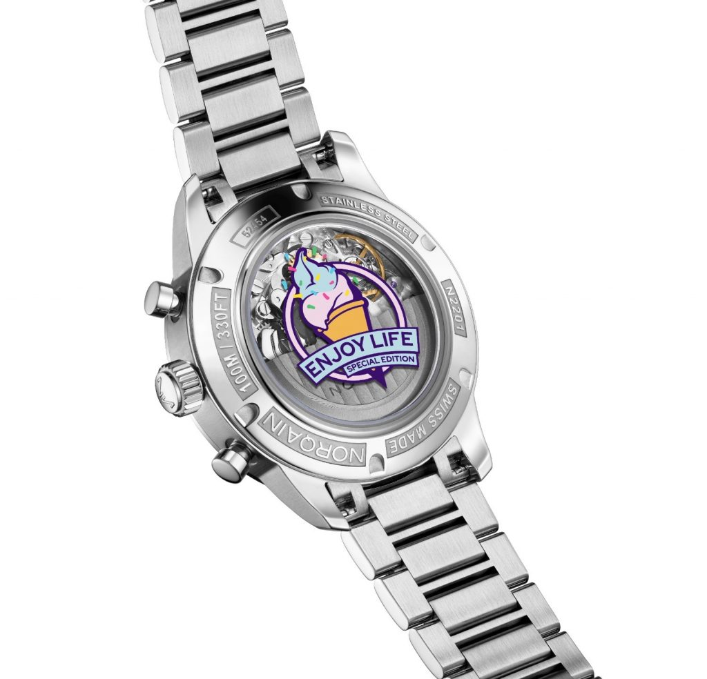 The open caseback, fitted with scratch proof sapphire crystal, reveals a personalised NORQAIN