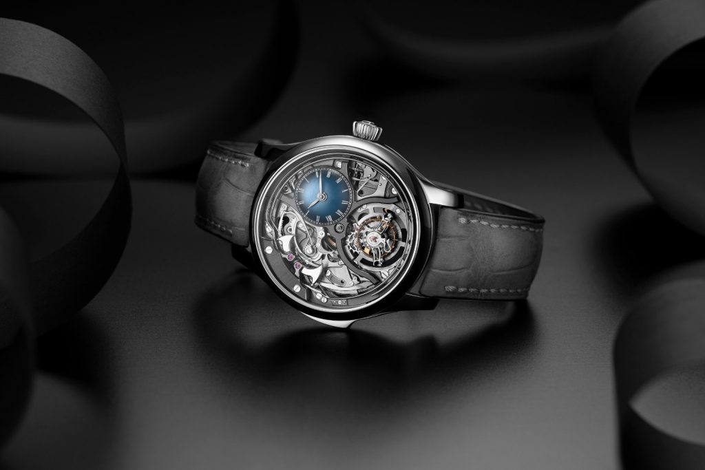 he timepiece is housed in a 40mm titanium case and has a sapphire crystal and a see through sapphire caseback