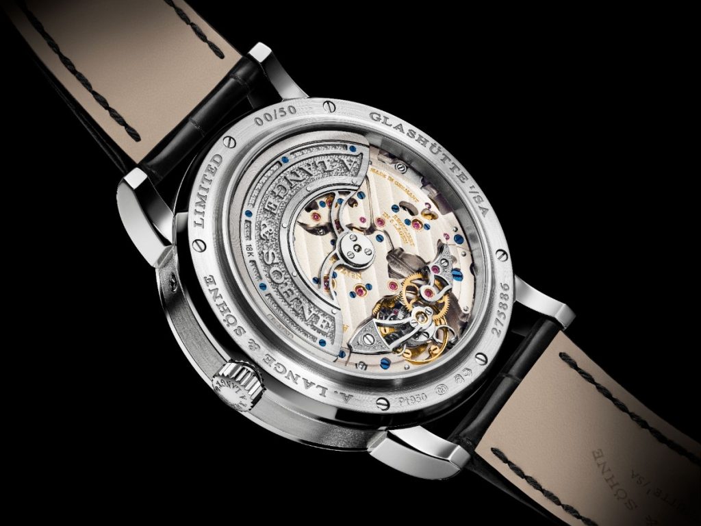 Beneath the semi transparent dial, the movement reveals itself in extraordinary detail