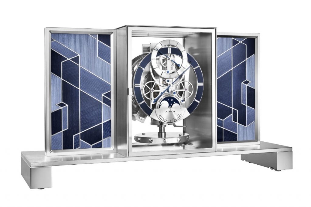 Blue lacquered hands complete the display, maintaining visual continuity and precision