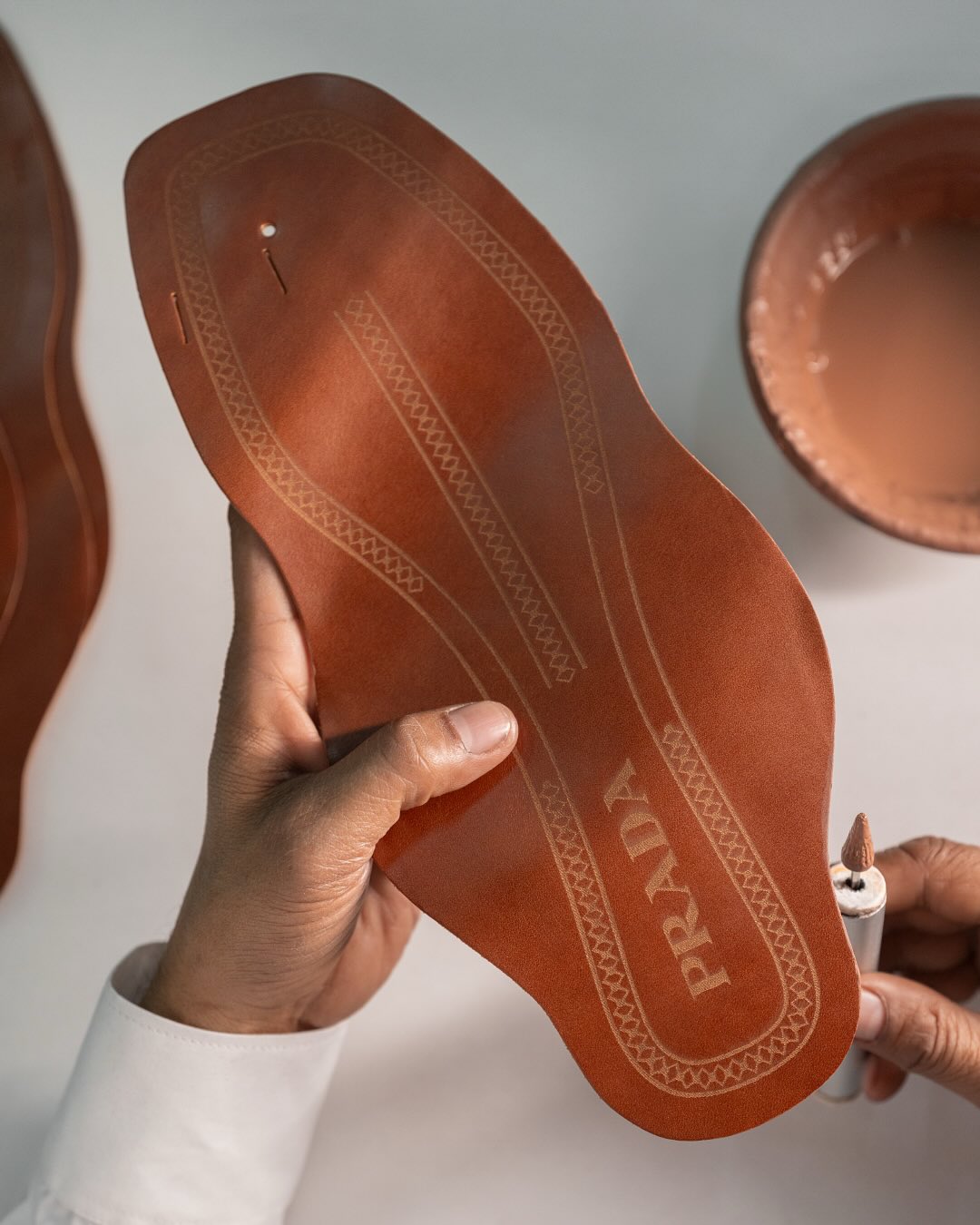 luxury sandals IndiaPrada India strategy Made in India fashion luxury Indian craftsmanship luxury brands global fashion brand backlash