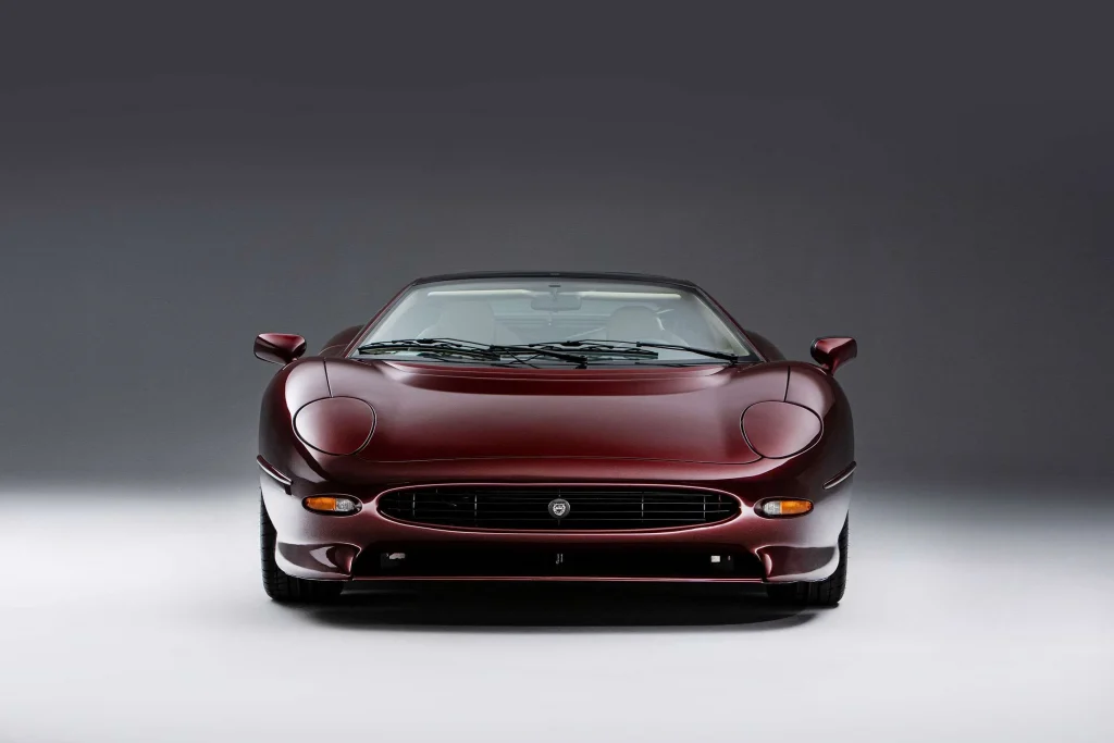People remember the XJ220 for controversy. It was supposed to have a V12