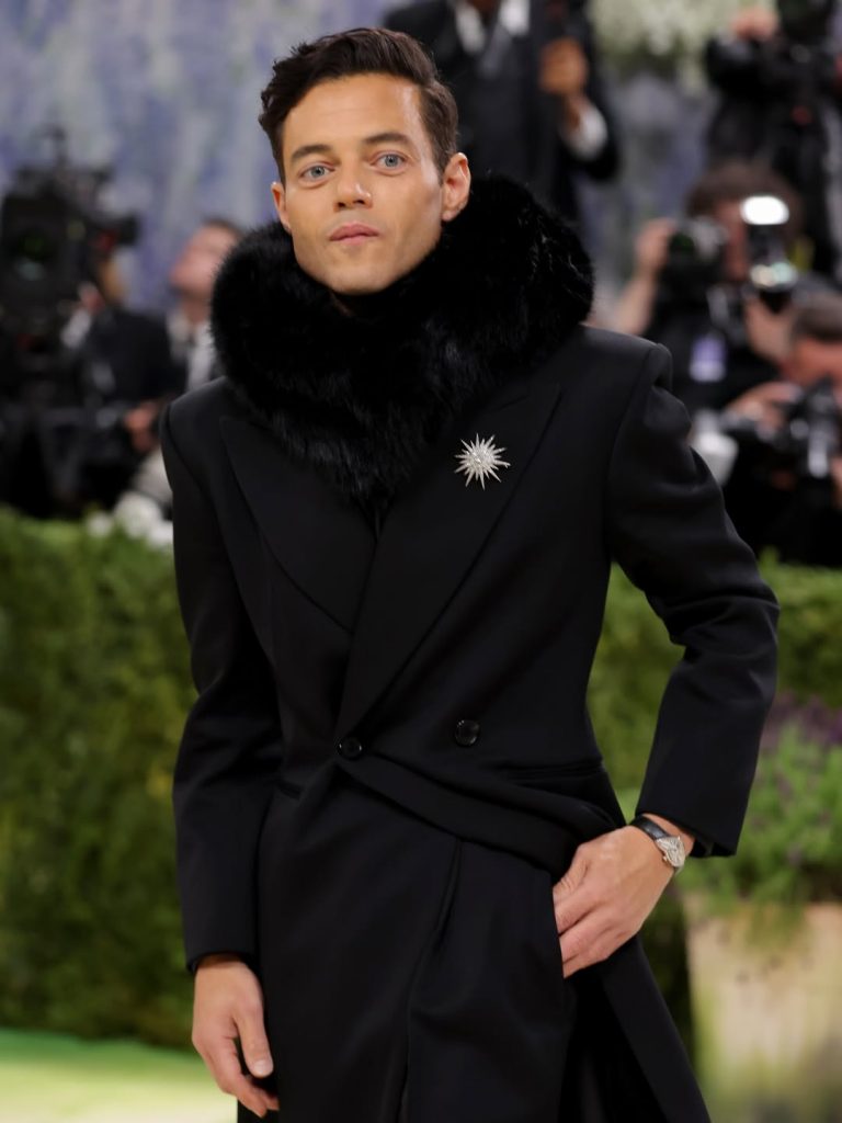 The Bohemian Rhapsody star wore a Cartier Crash Platinum timepiece