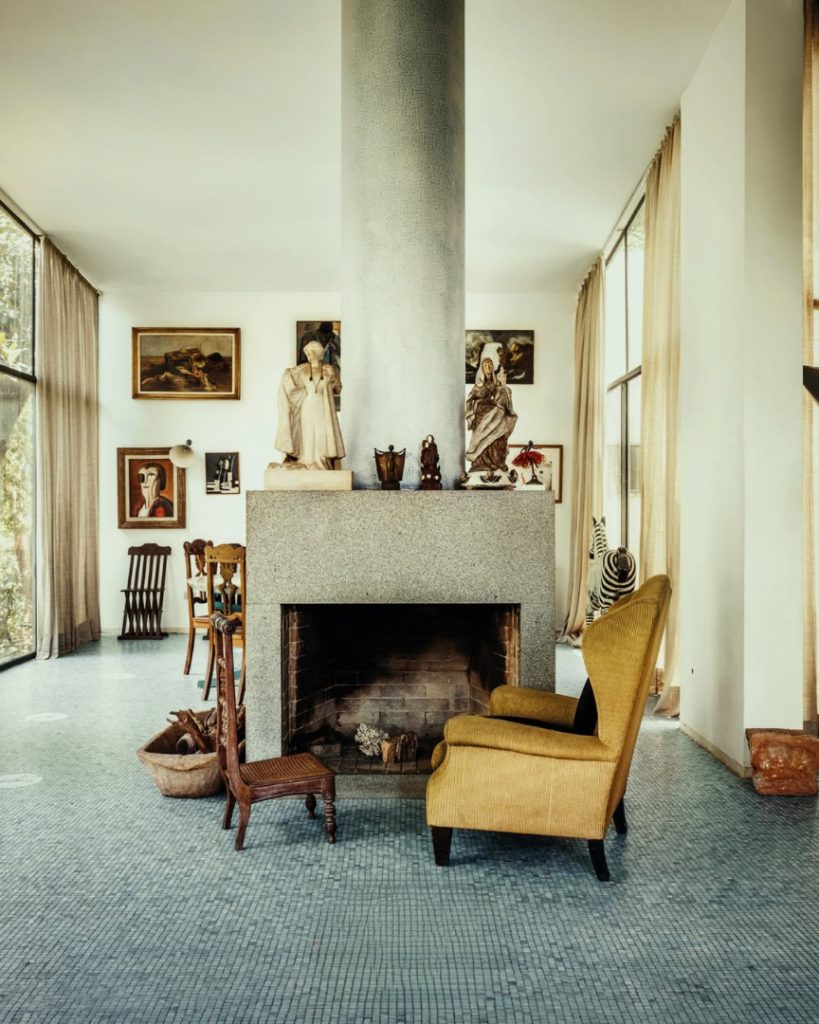 The house is lifted off the ground, suspended delicately on pilotis