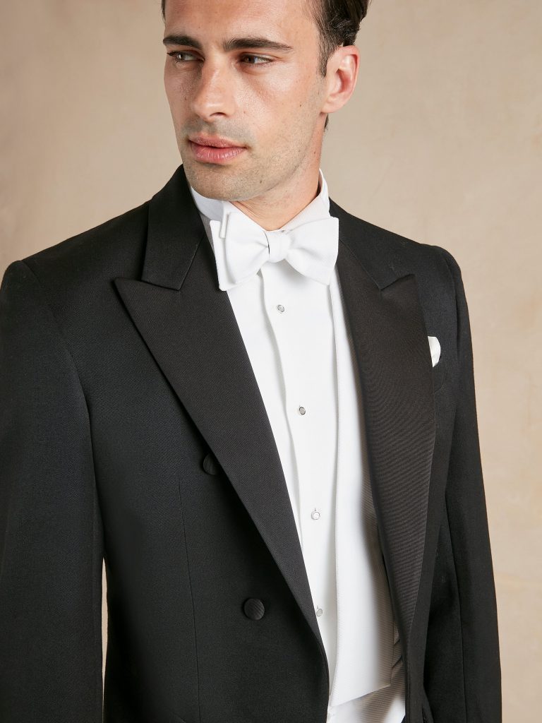 White bow tie belongs to White Tie. And White Tie is not simply “very formal