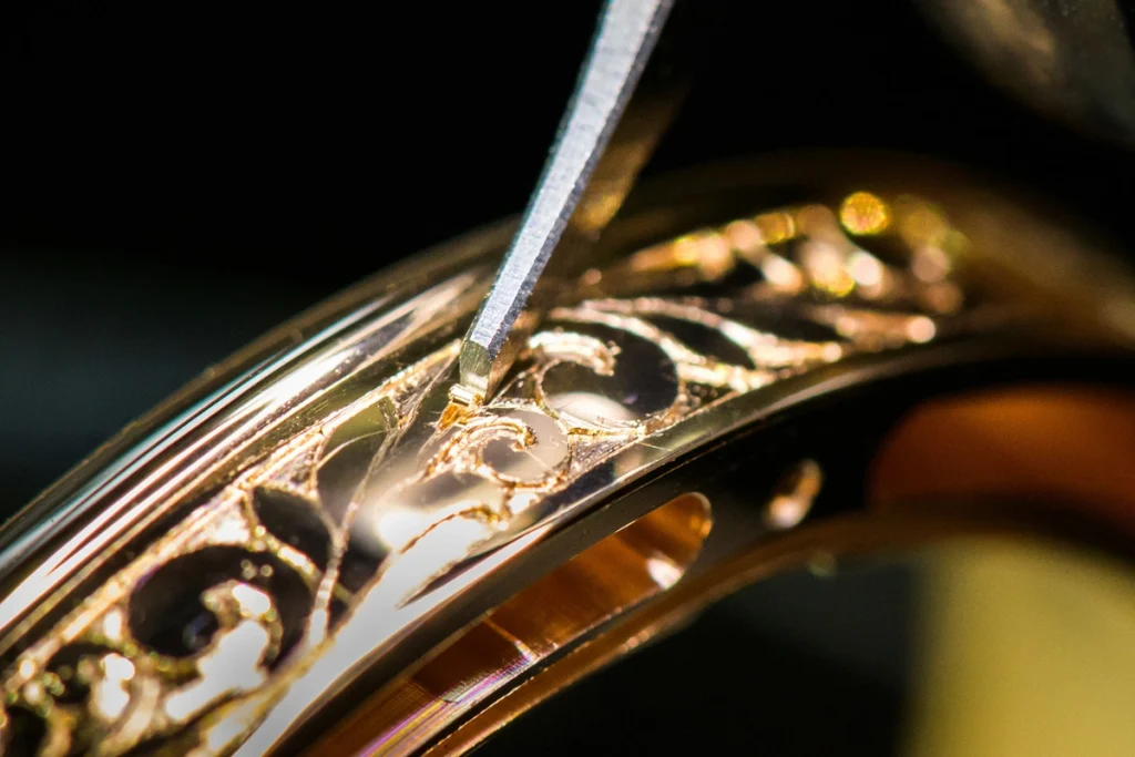 Collectors value engraving because it introduces individuality into an otherwise mechanical object.