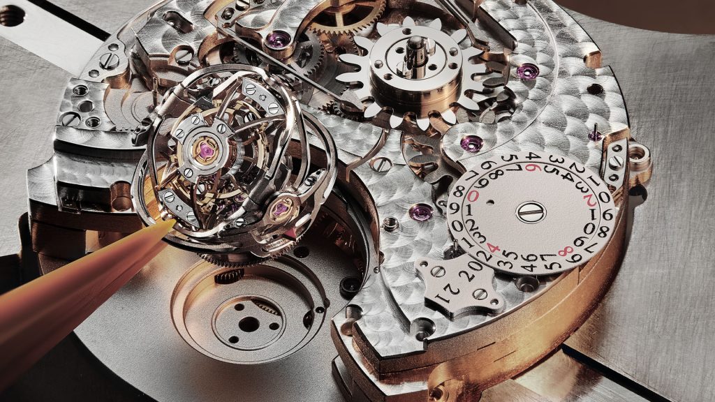 The tourbillon itself is a marvel, featuring three titanium cages