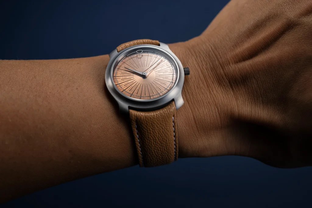 The watch features a 35 mm monobloc tantalum case crafted by J.N. Shapiro in California
