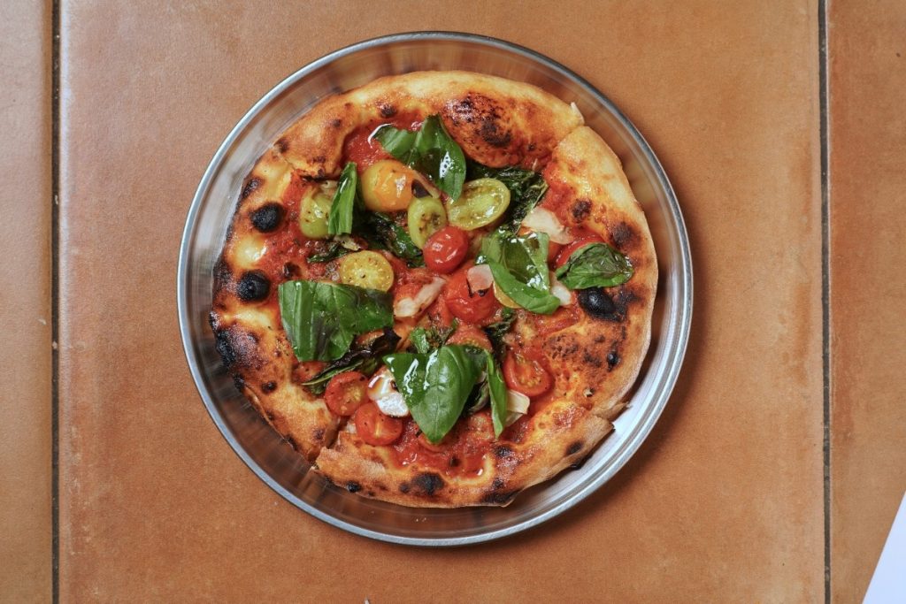 As diners around me tucked into their pizzas with audible delight