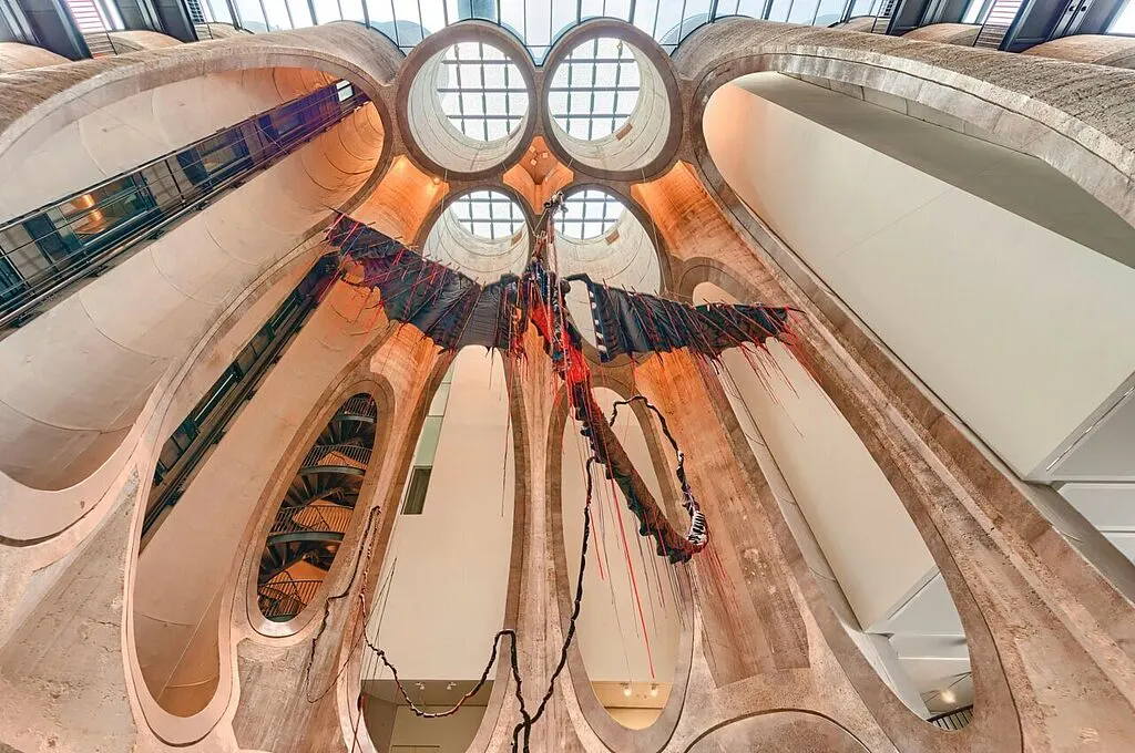 A forgotten industrial giant becomes a cultural landmark where concrete, history and creativity merge into one extraordinary architectural experience