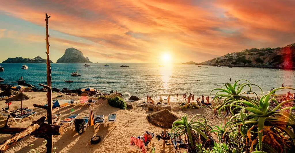 Gemini needs an island with two personalities, and Ibiza delivers exactly that