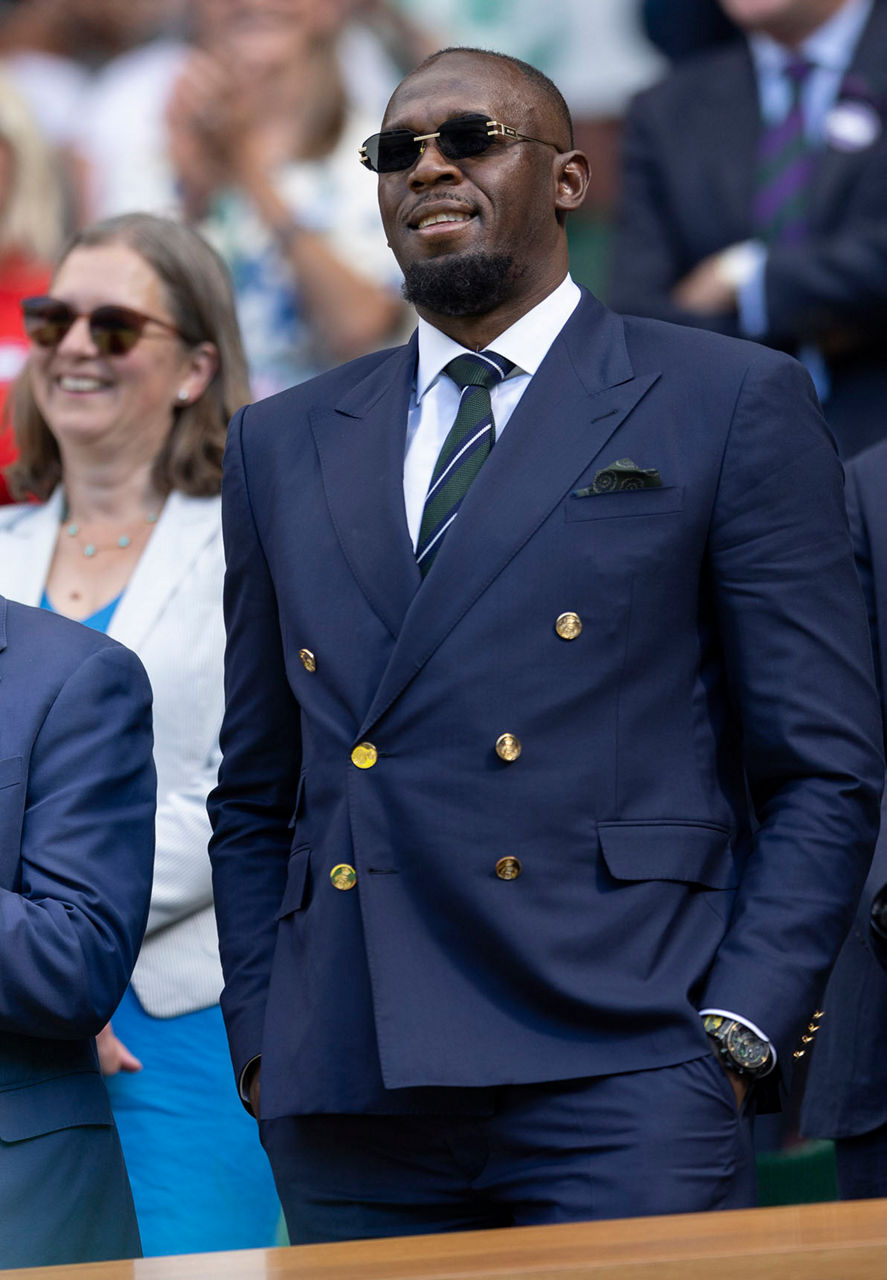 Usain Bolt stands in the Royal Box