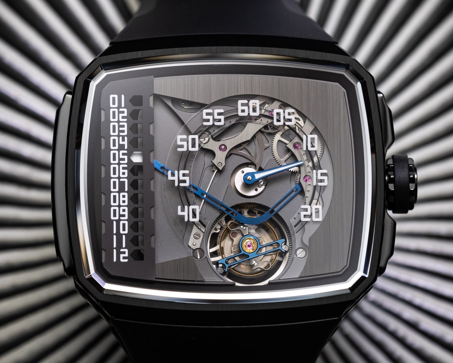 A conventional hand travels around the dial in endless circles. A retrograde hand