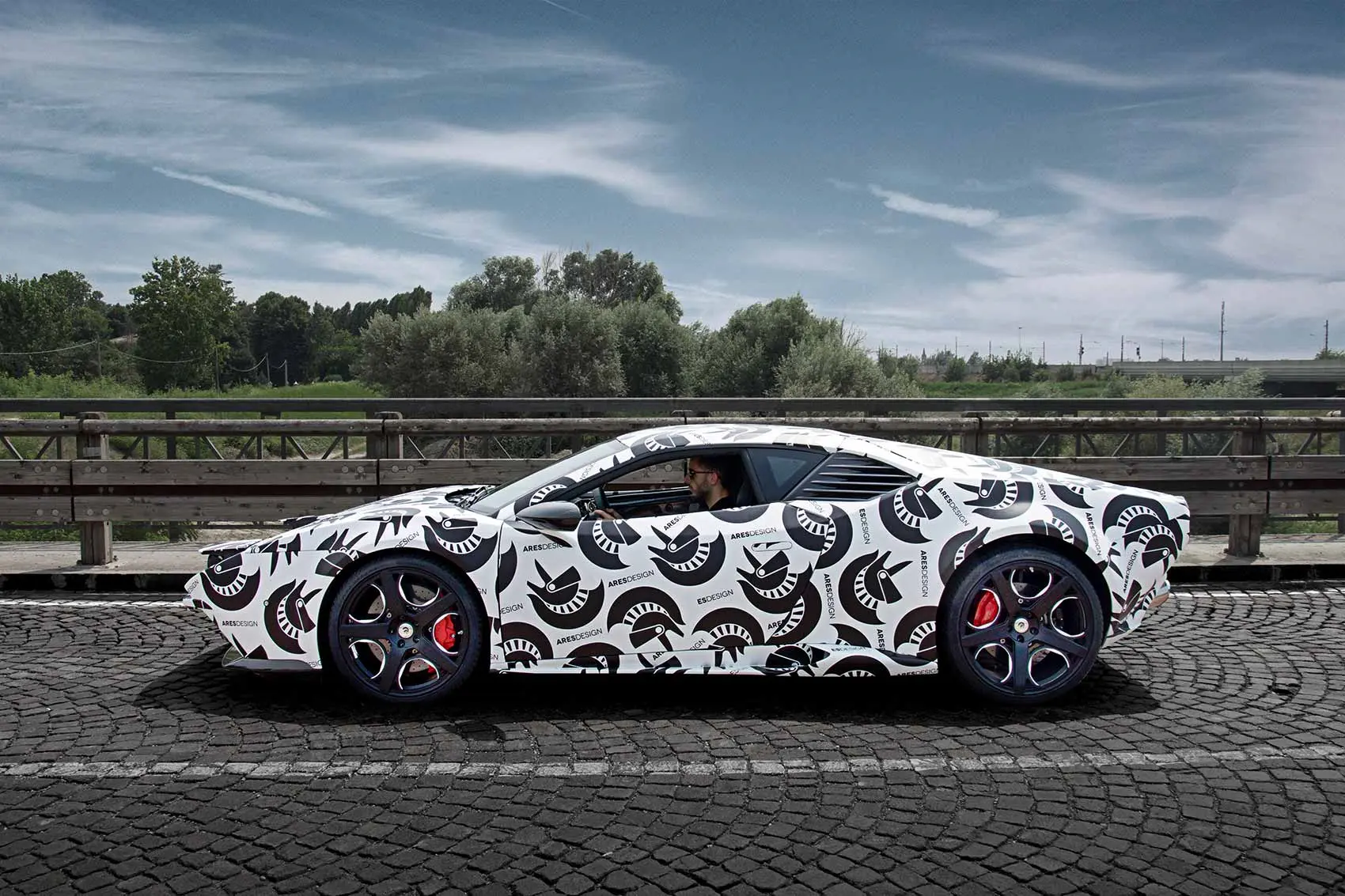 Camouflage extends well beyond the vinyl wrap. Manufacturers frequently install temporary