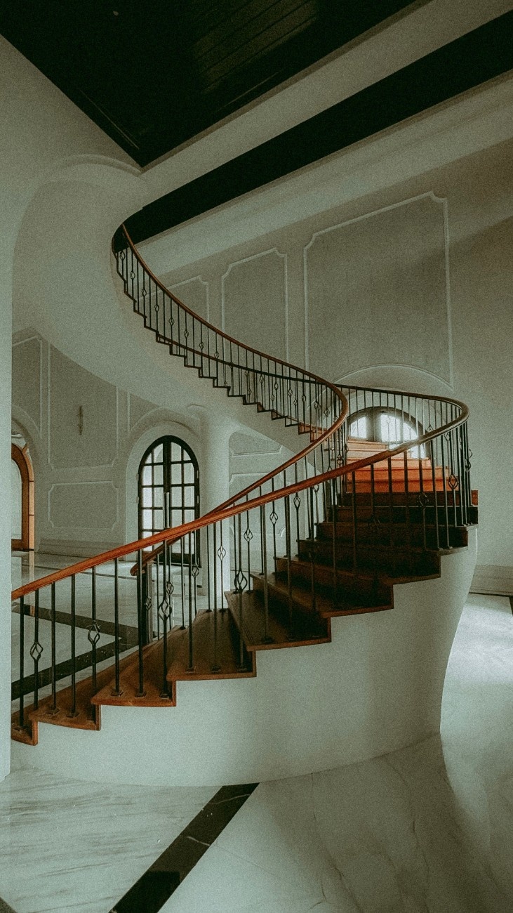 The personality of a spiral staircase is defined as much by its material as by its form