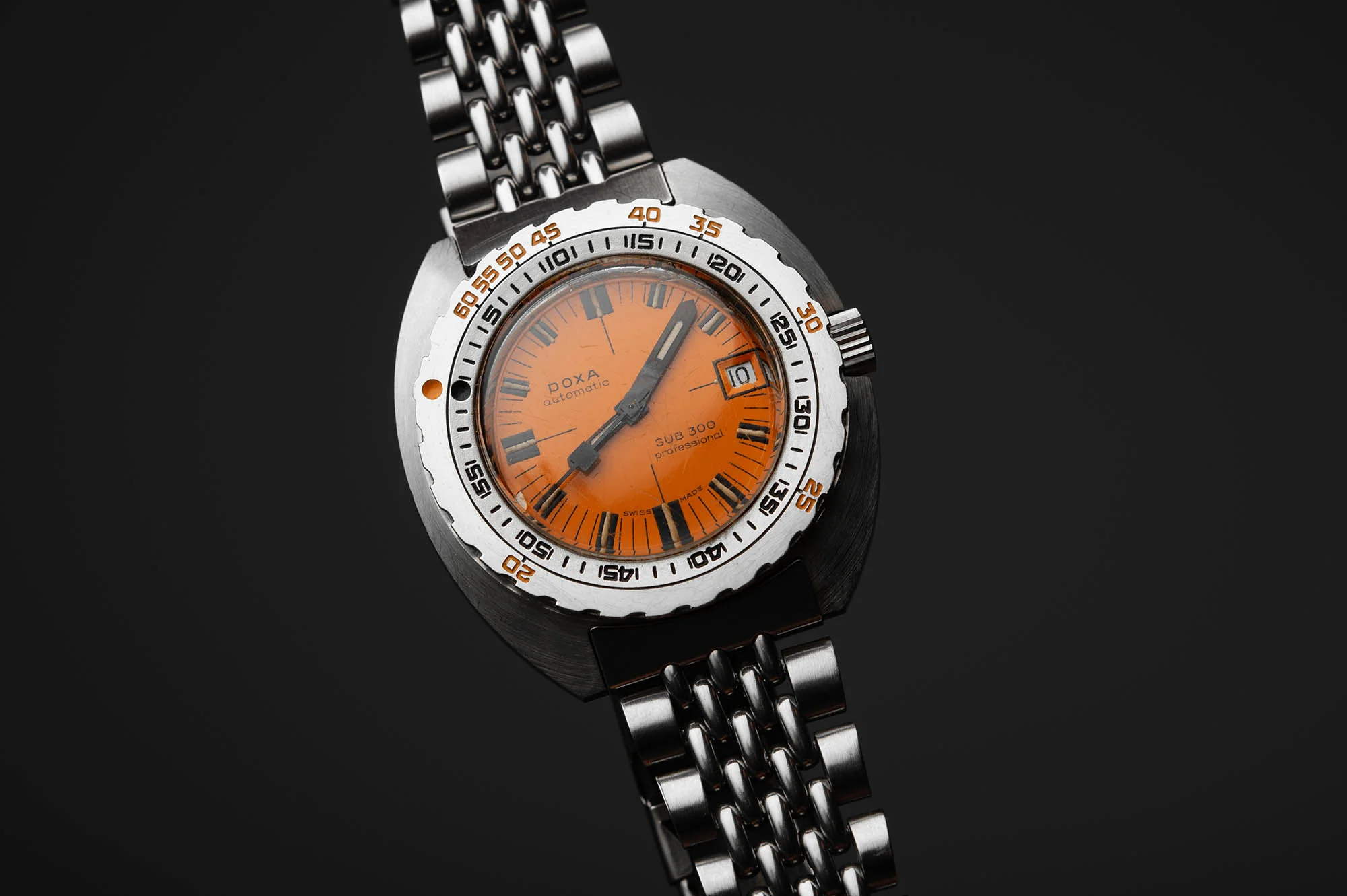 Unlike brands that merely adopted diving aesthetics, Doxa earned its reputation through genuine professional use