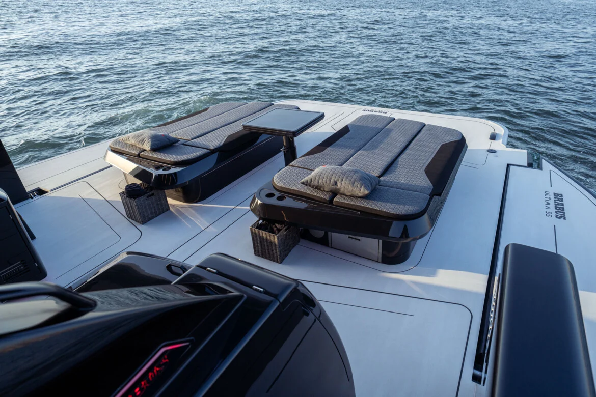 The aft deck serves as the primary outdoor living area and has a rather clever party trick of its own