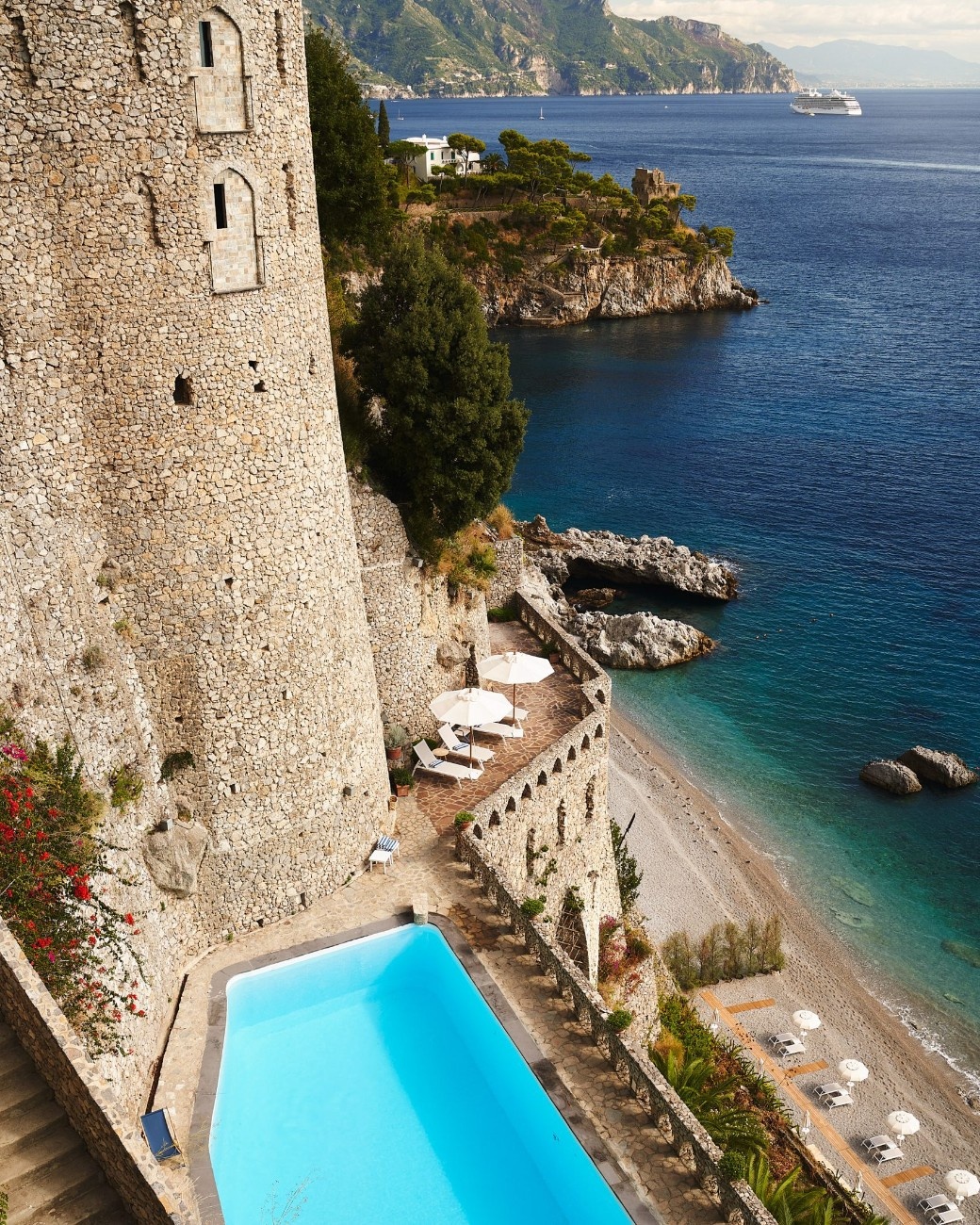 The Amalfi Coast has never really believed in flat land. Houses cling to cliffs, roads snake around mountains