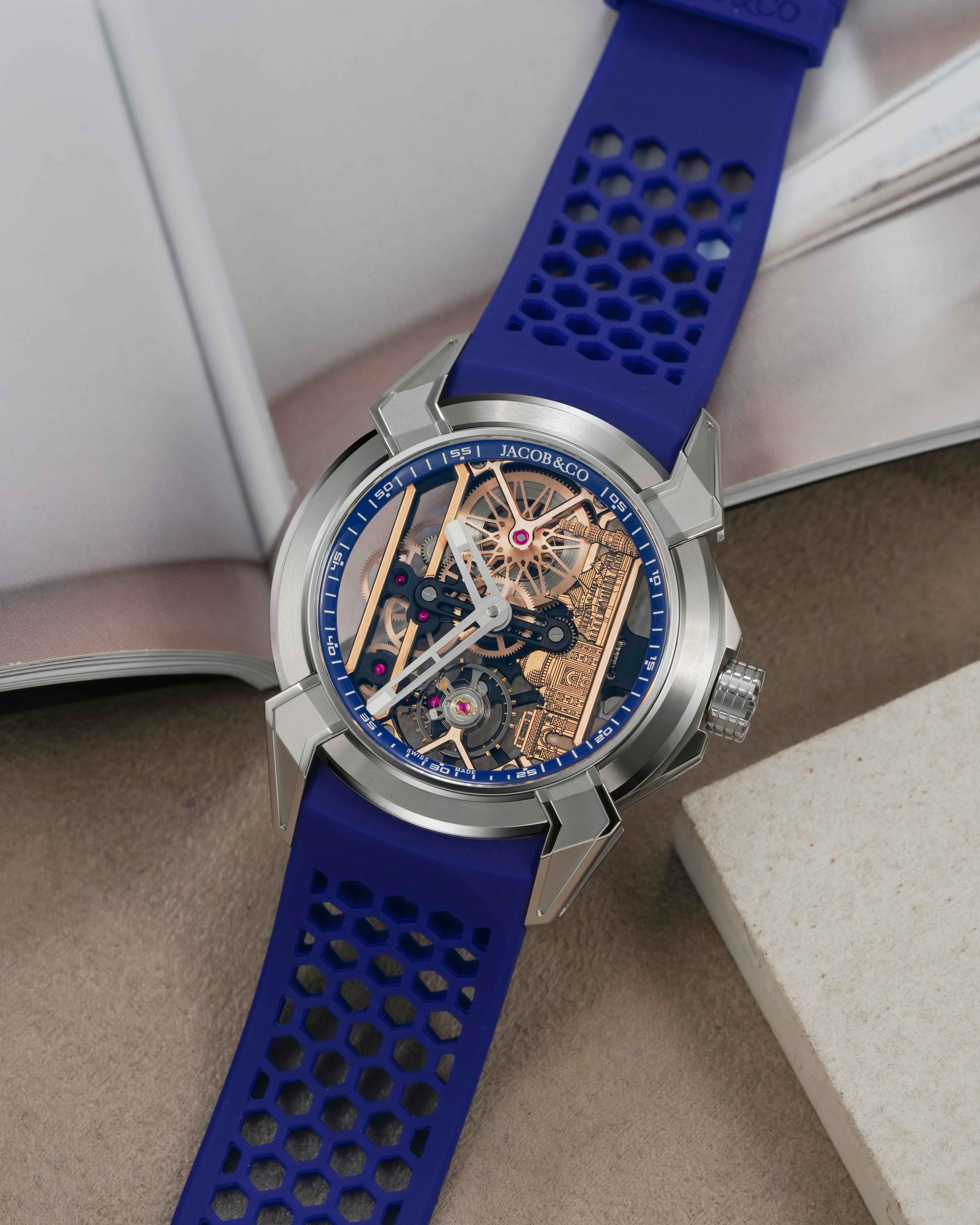 The 44mm model is distinguished by a titanium case, X shaped lugs, a skeletonised dial and a coloured