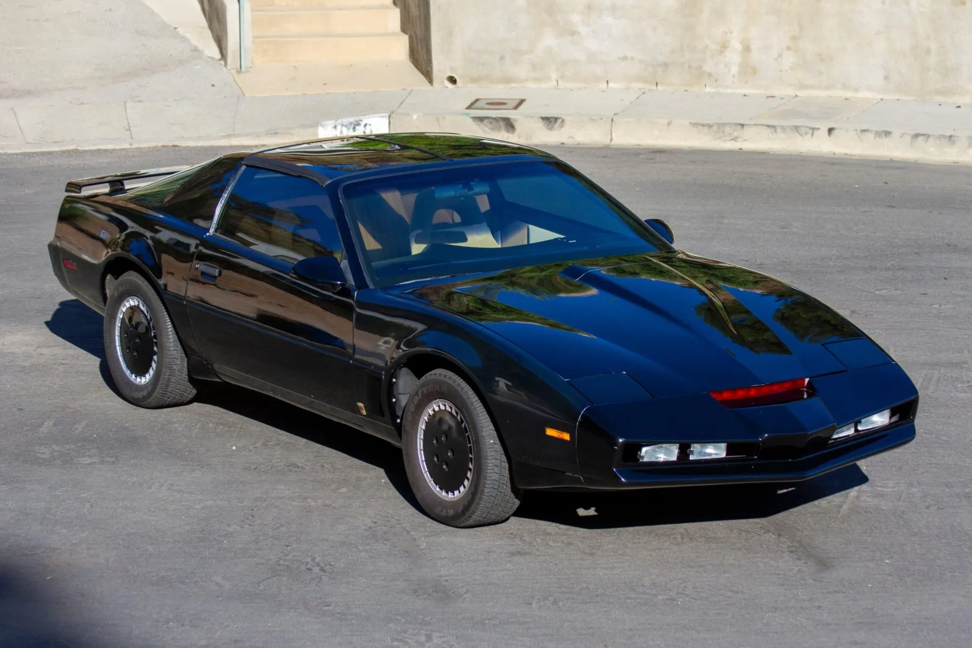Some cars have a dashboard. KITT had a personality disorder. Knight Rider transformed a black 1982